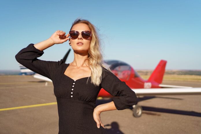 lovely-lady-sunglasses-posing-near-plane-1500x1000.jpg