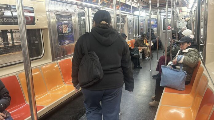 orange_yellow_r62_subway_ny1.jpeg