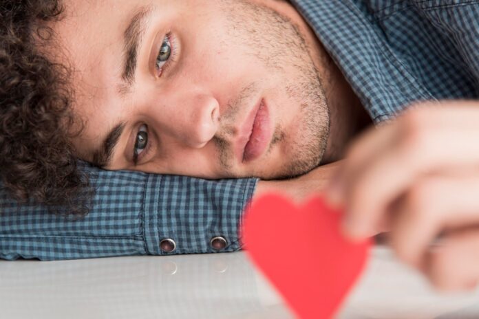 close-up-man-holding-heart.jpg